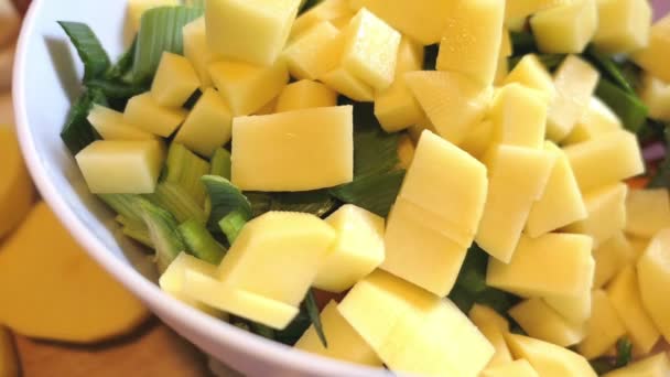 Giving Raw Sliced Potato Bowl Other Soup Ingredients — Stock Video