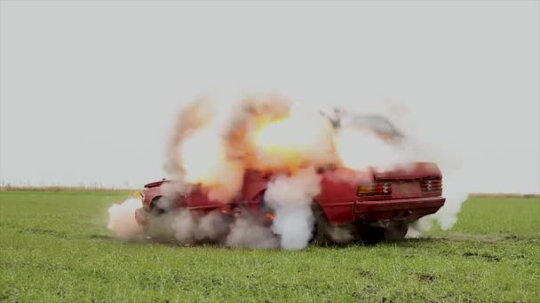 Car Explosion In The Field. — Stock Video