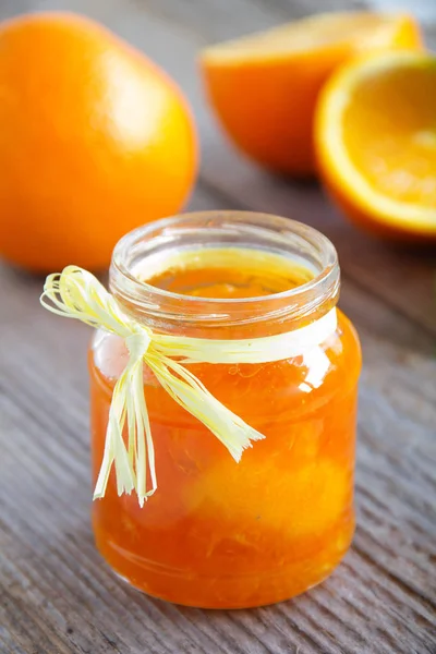 Orange sweet marmalade in jar.