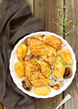 Fırında Tavuk uyluk patates ve sebze ile.