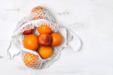 Pamuk kafes yeniden kullanılabilir çanta, sarı backg organik kanlı portakal