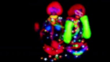 Uv floresan kostüm siyah arka plan üzerine iki kadın disco dansçı