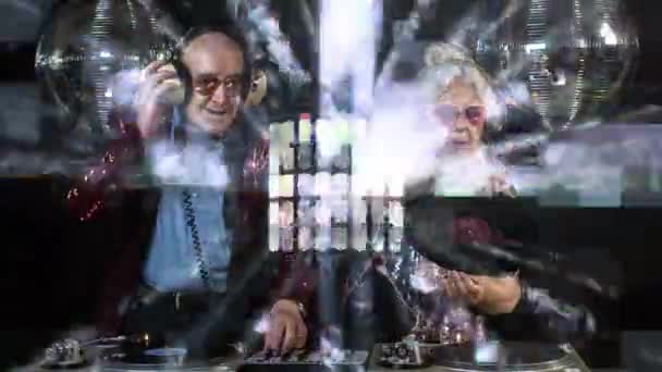 Older Couple Partying Disco Setting Scratching Turntables — Stock Video