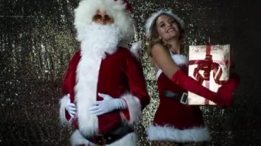 Noel Baba ve güzel Bayan Claus disko partide dans