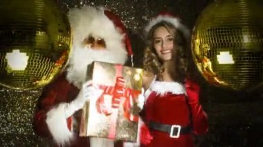 Noel Baba ve güzel Bayan Claus disko partide dans