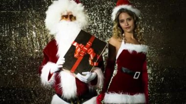 Noel Baba ve güzel Bayan Claus disko partide dans