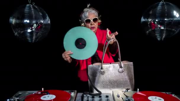Grandmother Holding Vinyl Record Disco Studio Background — 비디오