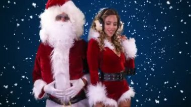 Noel Baba ve güzel Bayan Claus disko partide dans