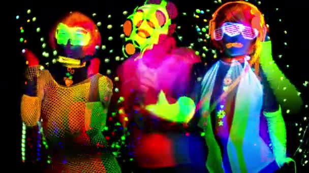 Two Women Man Gas Mask Fluorescent Clothing Dancing — Stock Video
