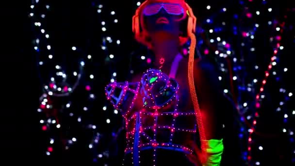 Sexy Woman Fluorescent Headphones Posing Black Light — Stock Video