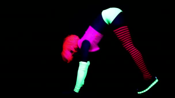 Woman Fluorescent Clothing Training Doing Exercises Black Light — Stock Video