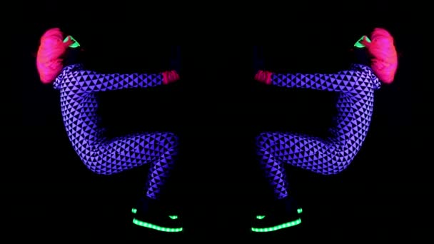 Woman Fluorescent Clothing Training Doing Exercises Black Light — Stock Video