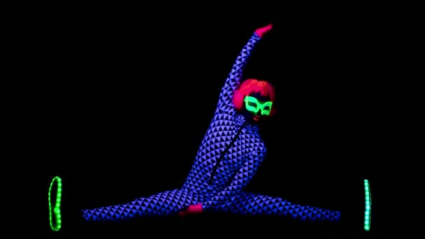 Woman Fluorescent Clothing Doing Exercises Black Light — Stock Video