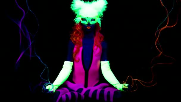 Female Yoga Lotus Pose Fluorescent Clothing Black Light — Stock Video