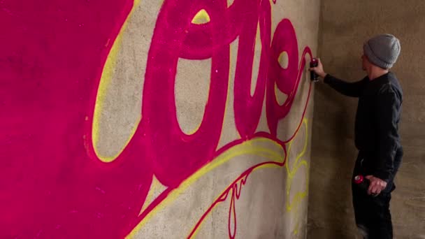 Process Graffiti Artist Spraying Word Love Concrete Wall — Stock Video