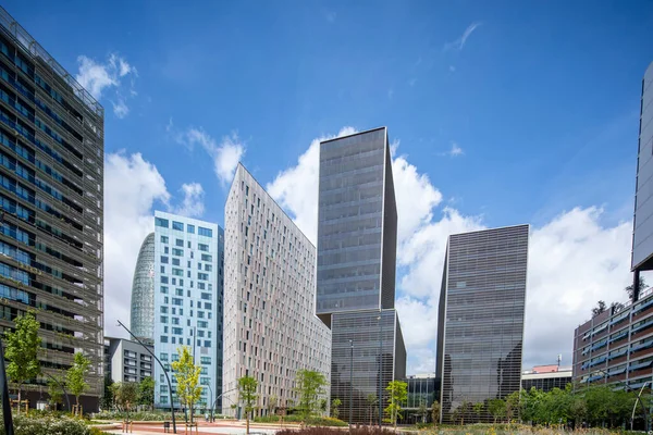 Skyscrapers with clouds in sky, Barcelona, Spain — Stock Photo, Image