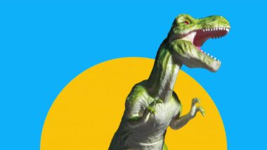 Plastik dinozorun sarı ve mavi arkaplana karşı görüntüsü