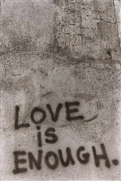 in the old wall the words of love is enought like concept of love and problem