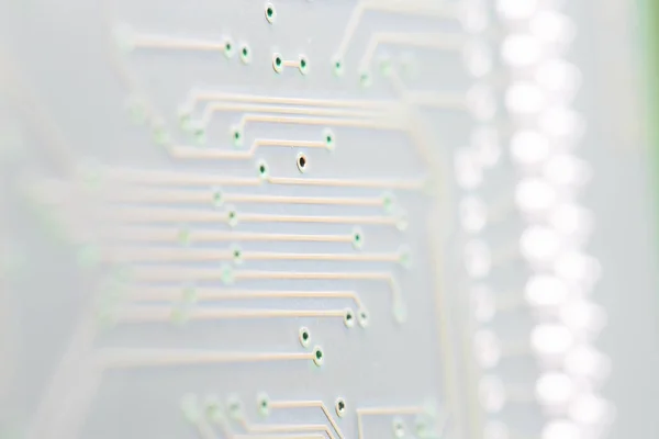 blurred circuit board in the light like concept of technology and future micro technology and compute
