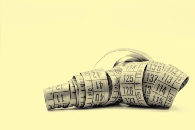 Diyet ve uzunluğu aracı kavramı gibi beyaz ışık kırmızı şerit metre bulanıklık ve girintili kopyalayın