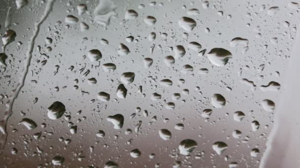 Abstract Texture Rain Drops Car Glass Close View — Stock Video