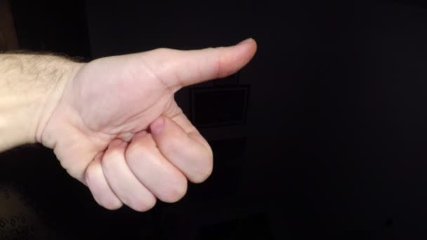 Close Footage Male Hand Showing Thumb Gesture Black Background — Stock Video