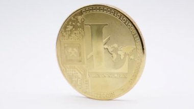 altın sikke litecoin simgesi olan beyaz hareketli yakın çekim görüntüleri