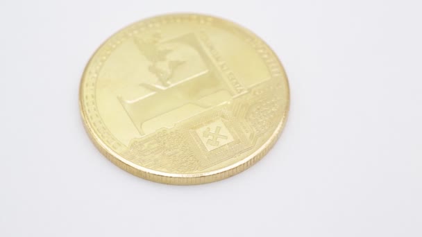 Detailní Záběry Rotující Mince Symbolem Litecoin Bílém — Stock video