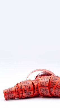 Diyet ve uzunluğu aracı kavramı gibi beyaz ışık kırmızı şerit metre bulanıklık ve girintili kopyalayın