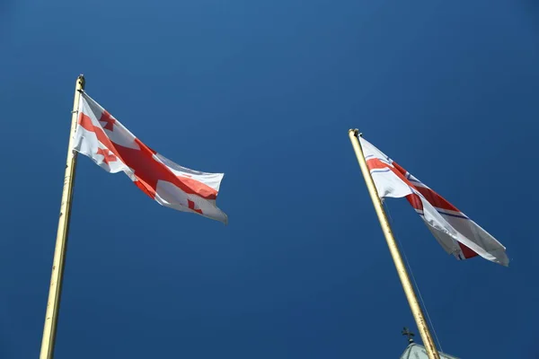 The waving blurred flag in the sky — Stock Photo, Image