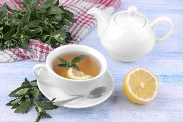 White Cup Tea Mint Lemon Kettle Blue Wooden Background — Stock Photo, Image