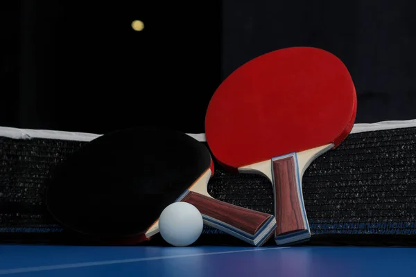 Ping pong. Accessories for table tennis racket and ball on a blue tennis table. Sport. Sport game.