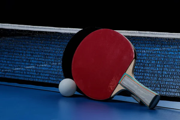 Ping pong. Accessories for table tennis racket and ball on a blue tennis table. Sport. Sport game.