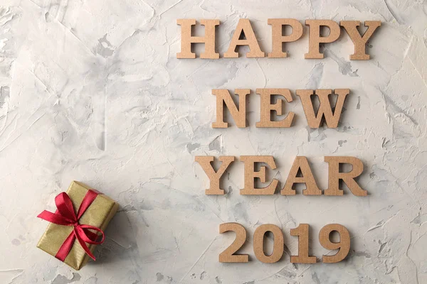 New Year 2019. Christmas. Holidays. Composition with New Year and Christmas gifts and the inscription happy new year