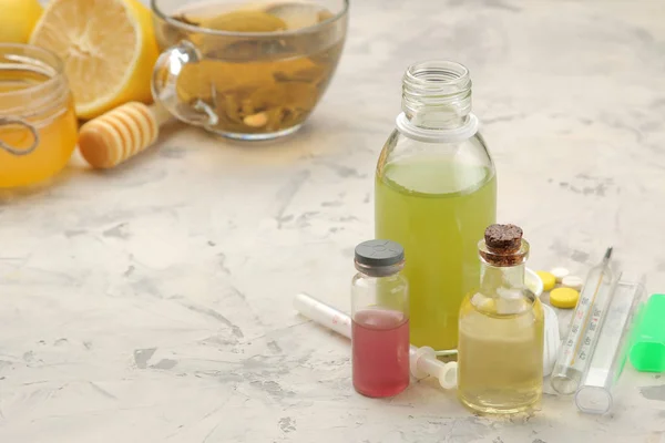 Various medicines for flu and cold remedies on a white wooden table .. Cold. diseases. cold. flu.