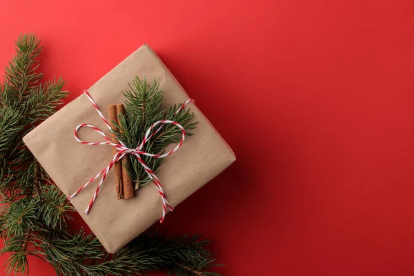 New Year. Christmas. holidays. frame of holiday gifts and new year decor on a red background. top view with space for text