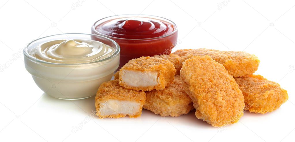 chicken nuggets with red and white sauce, ketchup on white isolated background. fast food