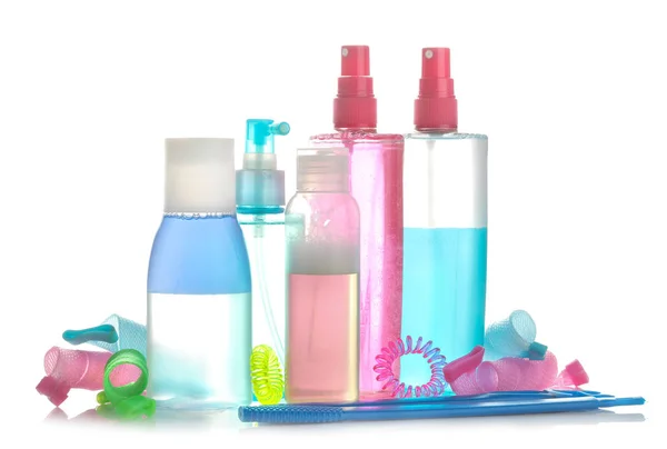 Various hair care products and various hair accessories on a white isolated background. hair cosmetics