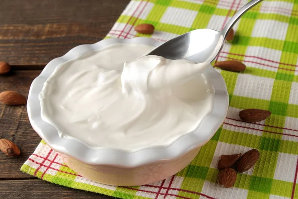 Greek Yogurt Ceramic Bowl Almond Nut Next Spoon Brown Wooden — Stock Photo, Image