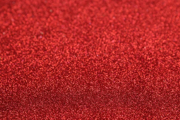 Beautiful texture of red sparkles. glitter background. shiny texture