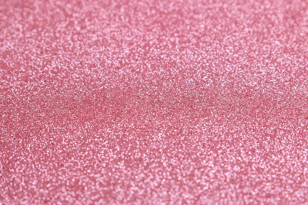 Beautiful texture of pink sparkles. glitter background. shiny texture