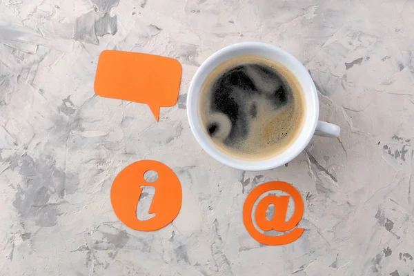 client support service. Contact us for feedback. work desk with a cup of coffee and various feedback icons.