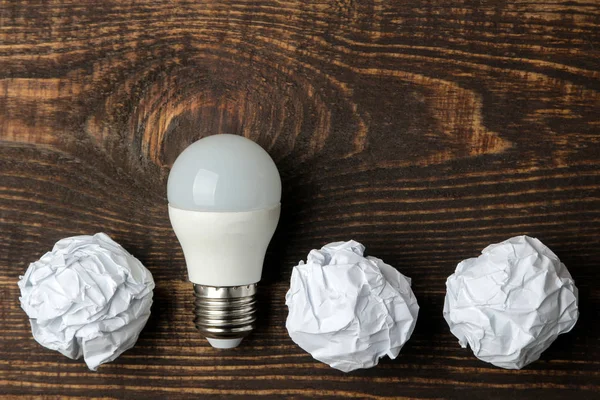 Concept creative idea. concept of creative idea. Bulbs of crumpled paper and light bulb. metaphor, inspiration.