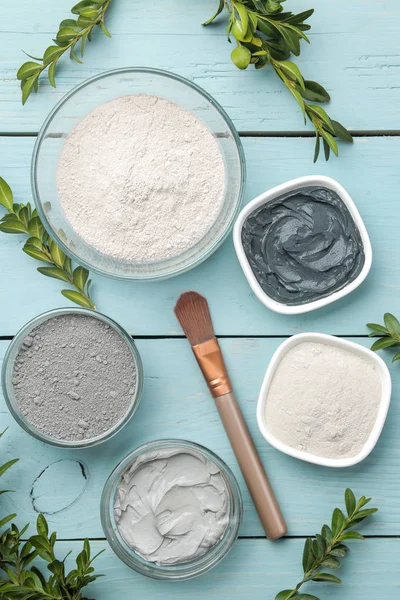 Cosmetic clay. clay facial mask on a gentle blue background. different types of clay. natural cosmetics for cosmetic procedures. Beauty concept. top view