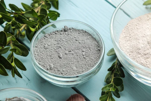 Cosmetic clay. clay facial mask on a gentle blue background. different types of clay. natural cosmetics for cosmetic procedures. Beauty concept.