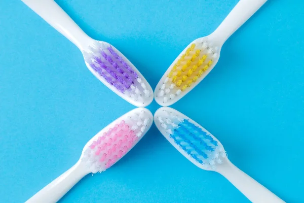 Oral Hygiene Multi Colored Toothbrush Bright Blue Background Top View — Stock Photo, Image