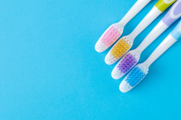 Oral Hygiene Multi Colored Toothbrush Bright Blue Background Place Text — Stock Photo, Image