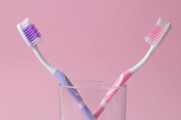 Oral Hygiene Multi Colored Toothbrush Glass Bright Pink Background — Stock Photo, Image