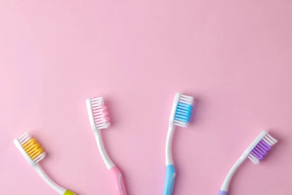 Oral Hygiene Multi Colored Toothbrush Bright Pink Background Top View — Stock Photo, Image