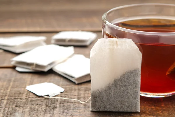 Tea Bag Glass Cup Brown Wooden Background Make Tea — Stock Photo, Image